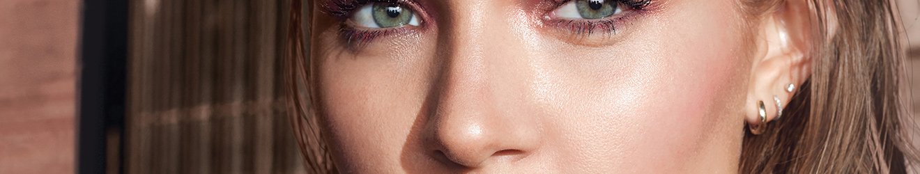 Maybelline Blush and Bronzer products illustrative banner image - Close up of green eyed model